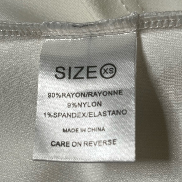 White Sheath Dress with Bishop Sleeves and Cold Shoulder - Picture 8 of 11